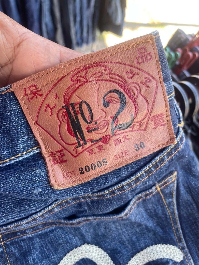 EVISU No. 2 Denim Shorts Size 30 (Category: Shorts) located in Talisay. Submitted by btchgetsome1 (Listing ID 1462073803, Image 3). Description: - Authentic Evisu denim shorts - Size 30 - Iconic Evisu seagull logo on back pockets - Unique paisley patch details (yellow, blue, pink) - Button fly closure - Made in Japan - Ideal for casual wear.
