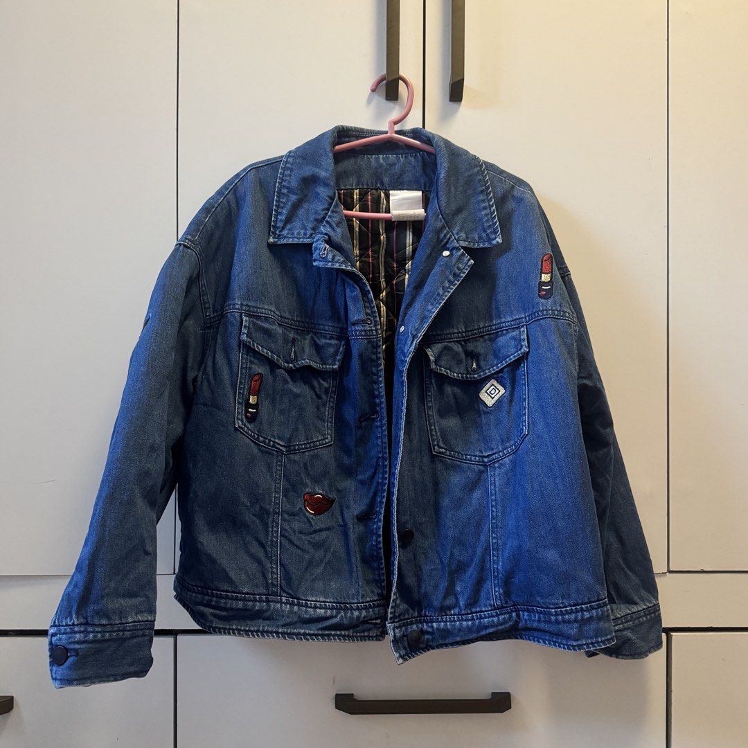 Fall/Winter Lined Blue Denim Jacket with Lipstick Patches (Category: Coats, Jackets and Outerwear) located in Quezon City. Submitted by closet.aid (Listing ID 1462113377, Image 1). Description: - Lined blue denim jacket - For Fall - Features unique lipstick patches - Ideal for Fall/Winter seasons - Size: L (EU 40/UK 12/US 8) - Condition: Excellent.