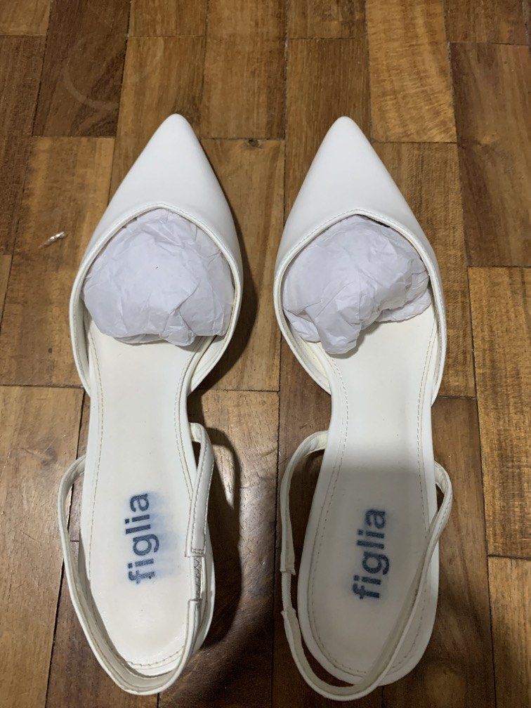 Figlia White Heels (Category: Heels) located in Caloocan City. Submitted by estrellamanila (Listing ID 1462186841, Image 1). Description: Used once only - for graduation.