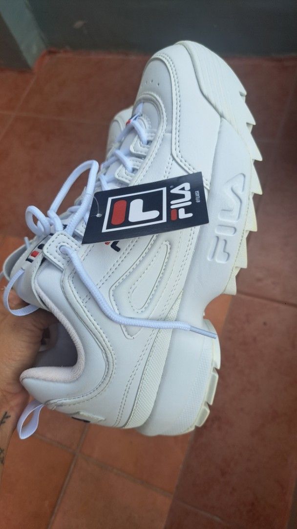 Fila Disruptor 2 White Chunky Sneakers (Category: Sneakers) located in Lipa City. Submitted by rebelcats (Listing ID 1462042652, Image 3). Description: - Classic Fila Disruptor 2 sneakers - Chunky platform style - Ideal for everyday wear - Comes with original tags attached - Ready for a new home.