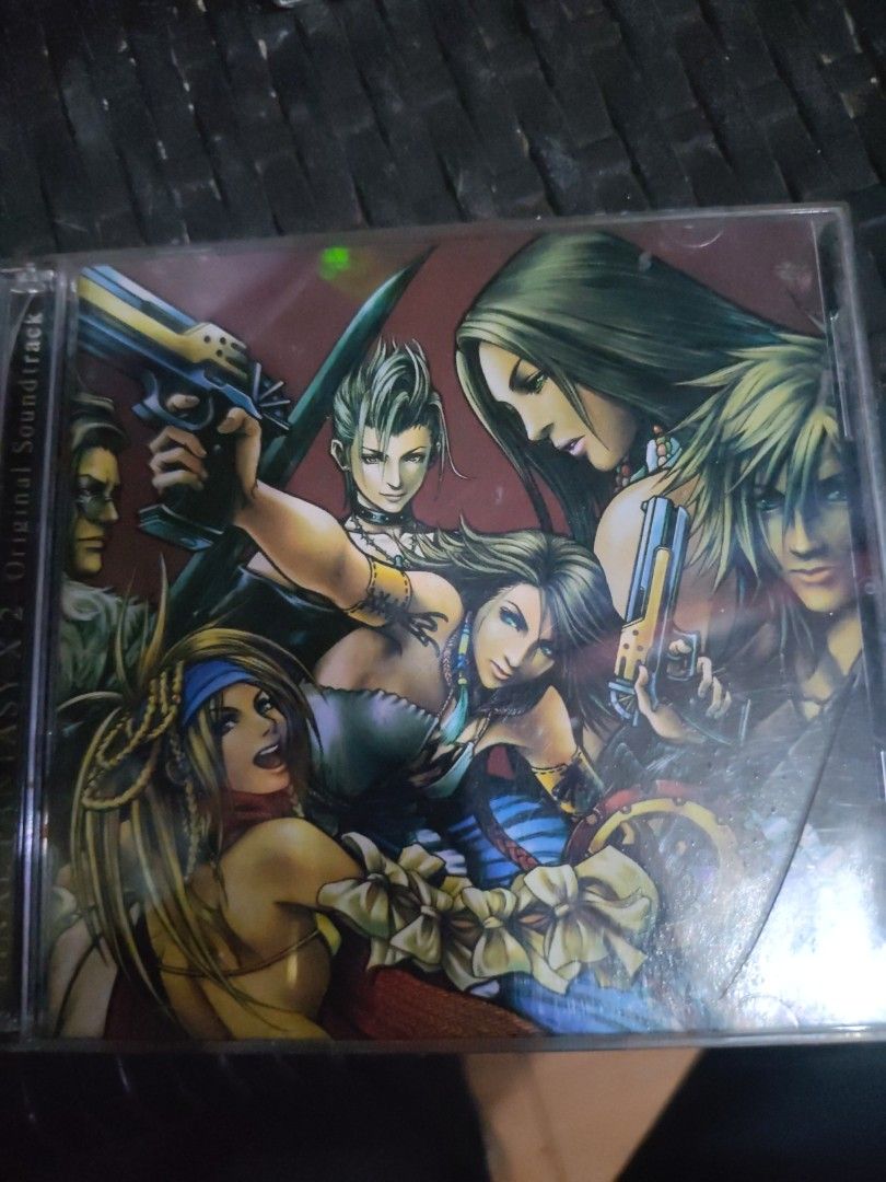 Final Fantasy VII Original Soundtrack CD (Category: CDs & DVDs) located in Quezon City. Submitted by elmerbayaban304 (Listing ID 1462237390, Image 2). Description: - Original Soundtrack for Final Fantasy VII - Features iconic music from the game - CD has a large '2' printed on it - Case insert displays two female characters from the game - A must-have for any Final Fantasy fan.
