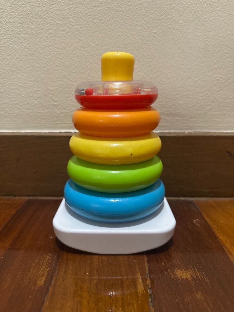 Fisher-price Rock a Stack Ring Stacking Toy (Category: Infant Playtime) located in Makati City. Submitted by travelfinds34611 (Listing ID 1462128090, Image 2). Description: Fisher-price Rock a Stack Ring Stacking Toy - Classic Fisher-Price stacking toy GREAT CONDITION. MINOR SIGNS OF WEAR FROM PLAY..