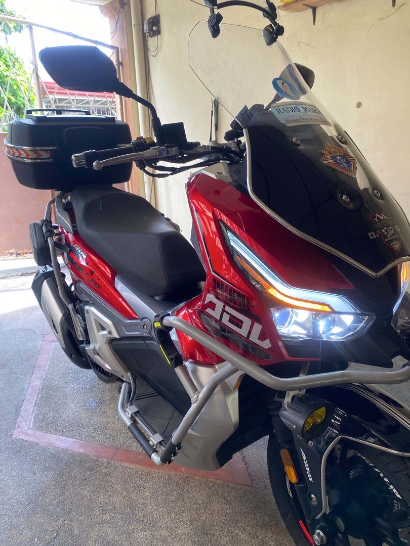 FKM Venture ADV 150 (2024 Model - Loaded) (Category: Motorbikes for Sale) located in Tarlac. Submitted by mikyleeee (Listing ID 1462174633, Image 3). Description: FKM Venture 150 Adventure Scooter (2024 Model - Low ODO) Note: Brand is FKM Venture 150 (Singaporean Brand), not Honda. Selected Honda on unit details for search visibility only. Vehicle Highlights: - Year Model: 2024 - Exact Mileage: 3,797 km only (Seldom used) - Engine: 150cc, 4-Valve