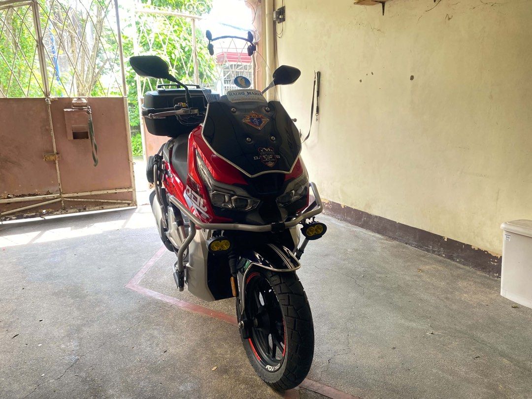 FKM Venture ADV 150 (2024 Model - Loaded) (Category: Motorbikes for Sale) located in Tarlac. Submitted by mikyleeee (Listing ID 1462174633, Image 1). Description: FKM Venture 150 Adventure Scooter (2024 Model - Low ODO) Note: Brand is FKM Venture 150 (Singaporean Brand), not Honda. Selected Honda on unit details for search visibility only. Vehicle Highlights: - Year Model: 2024 - Exact Mileage: 3,797 km only (Seldom used) - Engine: 150cc, 4-Valve