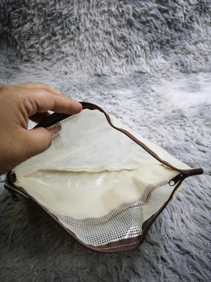 Flat Double Zipper Mesh Organizer Pouch (Category: Purses & Pouches) located in Santa Cruz. Submitted by jmy_surplus.2 (Listing ID 1462176164, Image 2). Description: Size ; L - 9 W - 11.4 Color ; Brown Type ; Pouch Brand ; No brand Material ; Plastic Style ; Brown Floral Zipper Closure Pouch LR 129 JMY 1 Batch #221.
