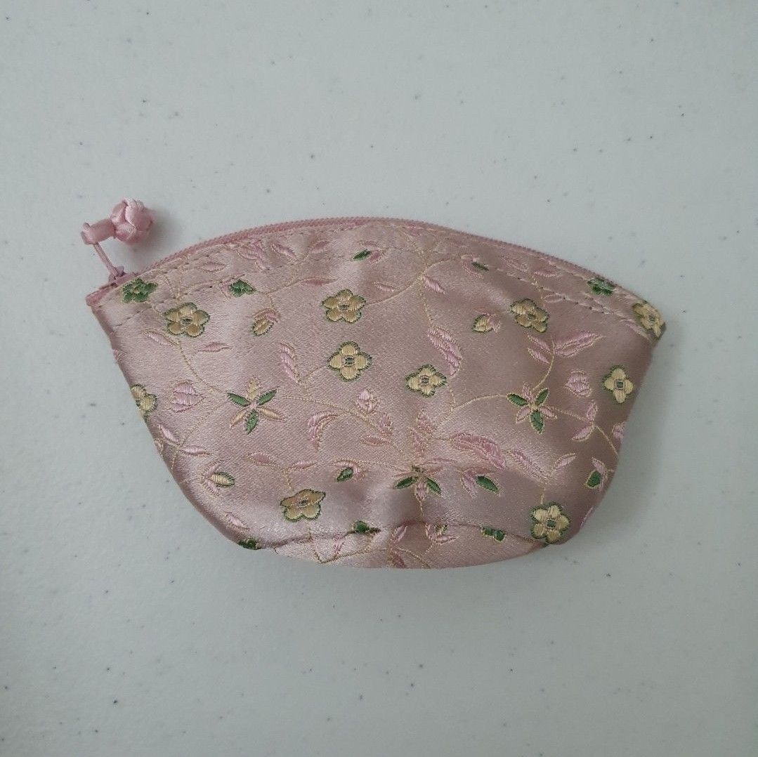 Floral Embroidered Coin Purse Pouch bundle (Category: Purses & Pouches) located in Paranaque City. Submitted by cobien (Listing ID 1462178792, Image 2). Description: - Adorable coin purse with charming floral embroidery. - Available colors: Pink and Silver/Grey. - Interior lining in vibrant Red or Green. - Secure zipper closure. - Approximate dimensions: 5 inches (width) x 3 inches (height). - Ideal for storing coins, cards, or other small essent