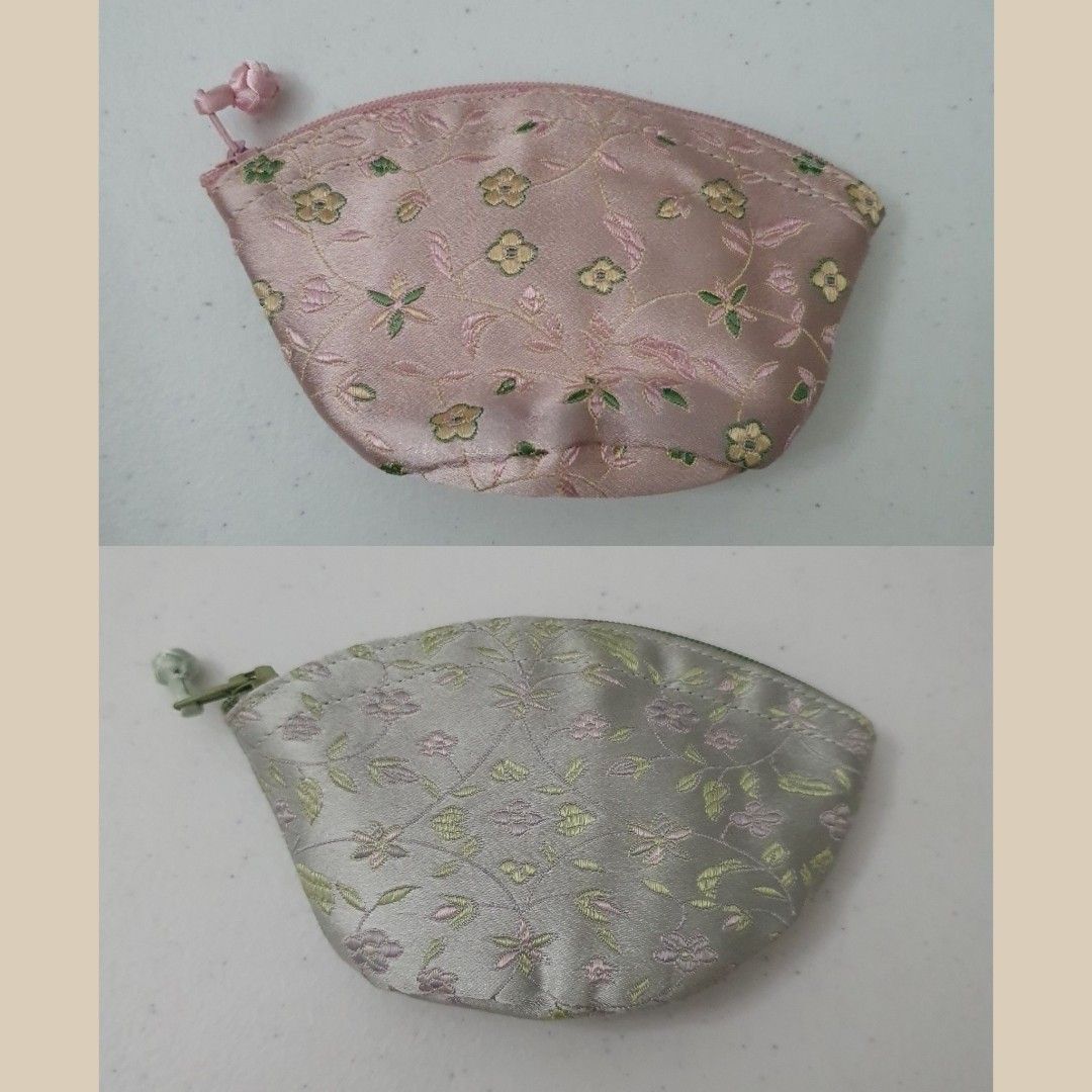 Floral Embroidered Coin Purse Pouch bundle (Category: Purses & Pouches) located in Paranaque City. Submitted by cobien (Listing ID 1462178792, Image 1). Description: - Adorable coin purse with charming floral embroidery. - Available colors: Pink and Silver/Grey. - Interior lining in vibrant Red or Green. - Secure zipper closure. - Approximate dimensions: 5 inches (width) x 3 inches (height). - Ideal for storing coins, cards, or other small essent