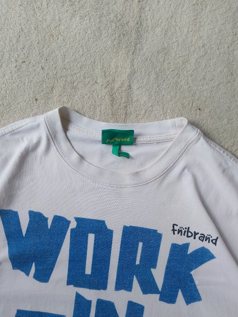 Fniibraänd "Work In Progress" Graphic Tee (Category: Tshirts & Polo Shirts ) located in Caloocan City. Submitted by sharpthreads18 (Listing ID 1462074474, Image 2). Description: - White Fniibraänd t-shirt - Bold blue "WORK-IN-PROG-RESS" graphic print - Short sleeves - Classic crew neck - Simple and direct statement piece - Great for casual wear.