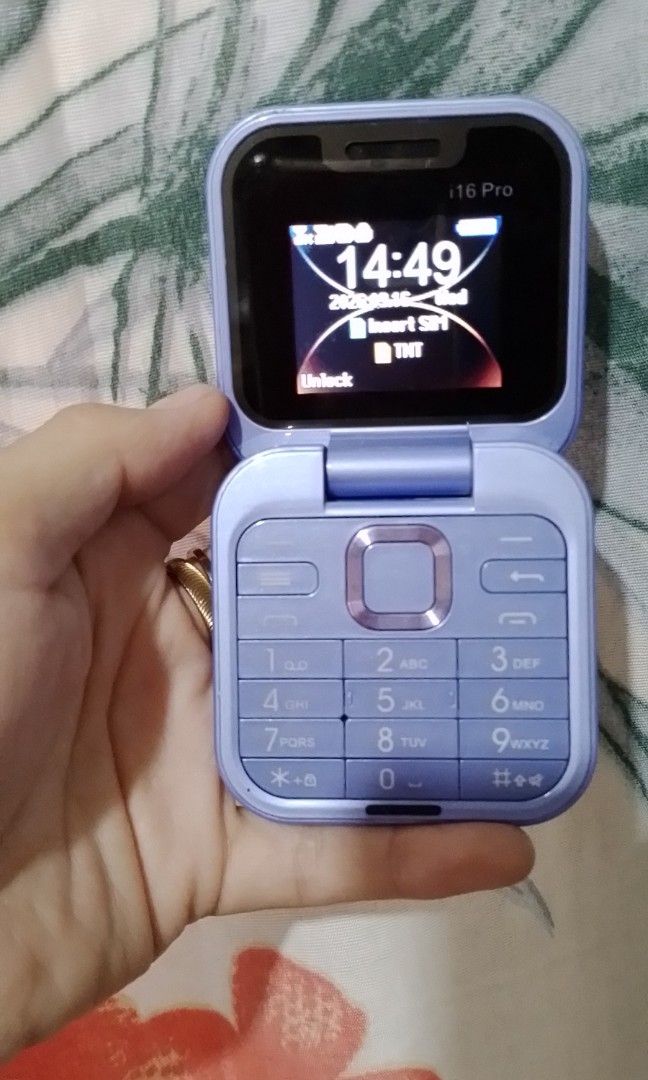 Foldable Basic Phone (Category: Early Generation Mobile Phones) located in Batangas. Submitted by zenrez_shop (Listing ID 1462099202, Image 1). Description: Foldable With fm radio with flashlight with camera (basic camera) 2 simcard slot 1 memory card slot with bluetooth calculator and more.