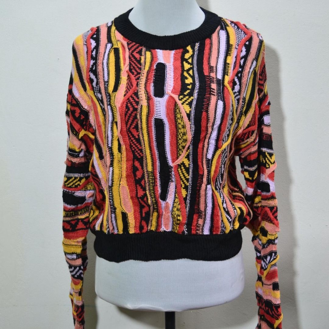 Forever 21 Colorful Knit Sweater Preloved (Category: Coats, Jackets and Outerwear) located in Polomolok. Submitted by lastthrift (Listing ID 1462201133, Image 2). Description: - Forever 21 knit sweater - Bold, colorful geometric pattern - Long sleeves and crew neck - Black trim on neckline, cuffs, and hem - Versatile: pairs well with jeans or skirts - A fun statement piece for your wardrobe - 19"x18".