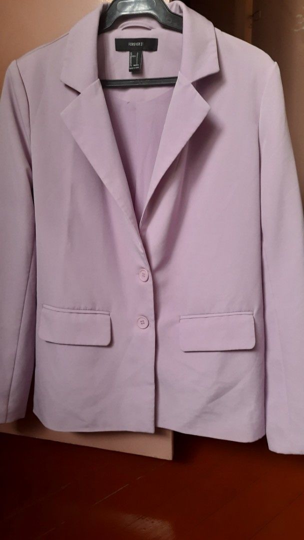 Forever 21 Light Purple Button Blazer Size S (Category: Coats, Jackets and Outerwear) located in Quezon City. Submitted by jasm_ (Listing ID 1462111654, Image 1). Description: Worn once. Good as new. - Light purple blazer from Forever 21 - Size S - Two-button front closure - with shoulder pads - Versatile for smart casual outfits with shorts or trousers.