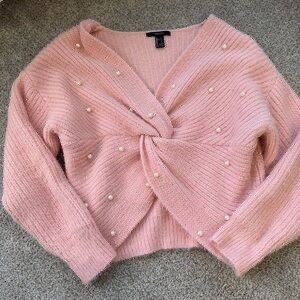 Forever 21 Pink Pearl Twist Front Sweater (Category: Longsleeves) located in Manila. Submitted by edgiedge (Listing ID 1462042556, Image 1). Description: Forever21 pink pearl sweater size L ₱250 Tondo.
