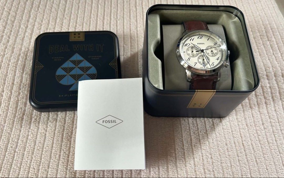 Fossil Chronograph Watch with Brown Leather Strap (Category: Men's Watches) located in Caloocan City. Submitted by aprilgarbs (Listing ID 1462070135, Image 2). Description: - Fossil Chronograph Watch - Genuine leather strap for comfort and style - Comes with original Fossil tin box and manual - Ideal for everyday wear or a thoughtful gift.
