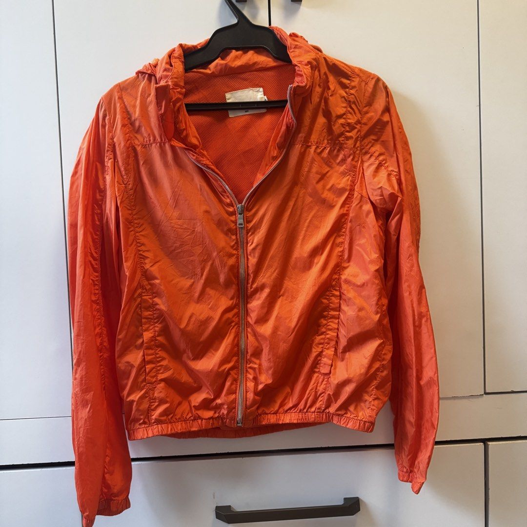 Free With Purchase Orange Lightweight Hooded Jacket (Category: Coats, Jackets and Outerwear) located in Quezon City. Submitted by closet.aid (Listing ID 1462113933, Image 1). Description: - Lightweight orange jacket - Attached hood - Full zip front closure - Elasticated cuffs and hem - Breathable mesh lining - Ideal for outdoor activities - Great as a layering piece - Packable and easy to carry.