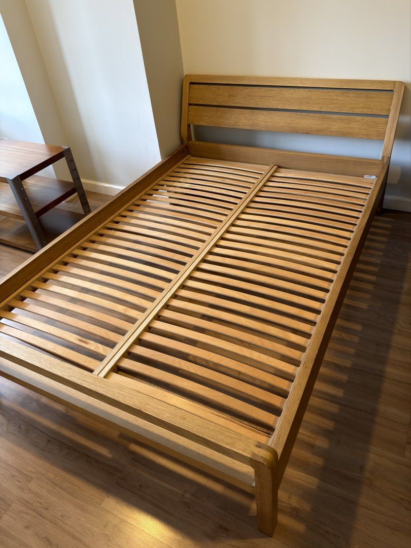 Full Size Bed Frame - Solid Wood, Walnut (Category: Bed Frames & Mattresses) located in Makati City. Submitted by maiemacale (Listing ID 1462163306, Image 1). Description: - Solid wood bed frame with slatted base - Matress not included - Dimensions: 225x146x84 cm (bed height 30cm) - Condition: Brand New, Unused Original Price: Php21,995 Selling Price: Php15,000.