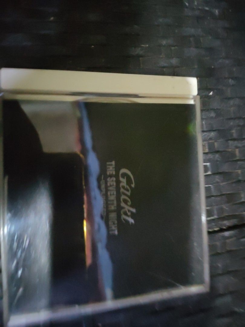Gackt The Seventh Night ~Unplugged~ CD (Category: CDs & DVDs) located in Quezon City. Submitted by elmerbayaban304 (Listing ID 1462239529, Image 1). Description: - Gackt The Seventh Night ~Unplugged~ CD - Original disc and case included - Case shows minor scuffs - Disc has light scratches but plays without issues - Perfect for Gackt enthusiasts.