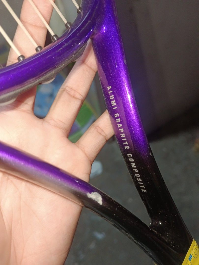 Gala 71 Alumi Graphite Composite Tennis Racket (Category: Racket and Ball Sports) located in Valenzuela. Submitted by relchris22 (Listing ID 1462123404, Image 2). Description: - Gala 71 Tennis Racket - Material: Alumi Graphite Composite - Head Size: 105 sq. in. - Recommended String Tension: 50-60 lbs - Condition: Grip is a bit worn, some scuffs on the frame - Note: Still has plenty of play left.