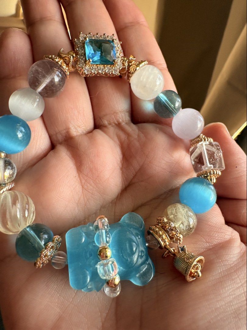 Gemstone DIY bracelet- Cat’s eye bear (Category: Bracelets) located in Manila. Submitted by charliesxcharms (Listing ID 1462037316, Image 2). Description: Cat’s eye bear charm, selenite, cq, moostone, citrine, topaz.