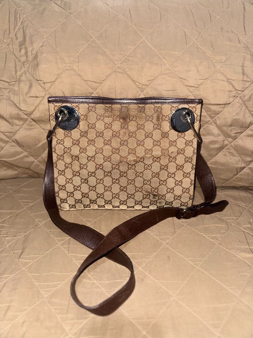 GG CANVAS ECLIPSE (Category: Luxury Bags & Wallets) located in San Pablo. Submitted by calmhawk.60c993 (Listing ID 1462218859, Image 1). Description: - Classic GG monogram canvas - Brown leather trim and strap - Silver hardware details - Signs of wear on canvas trim - Interior is clean - Great everyday bag.