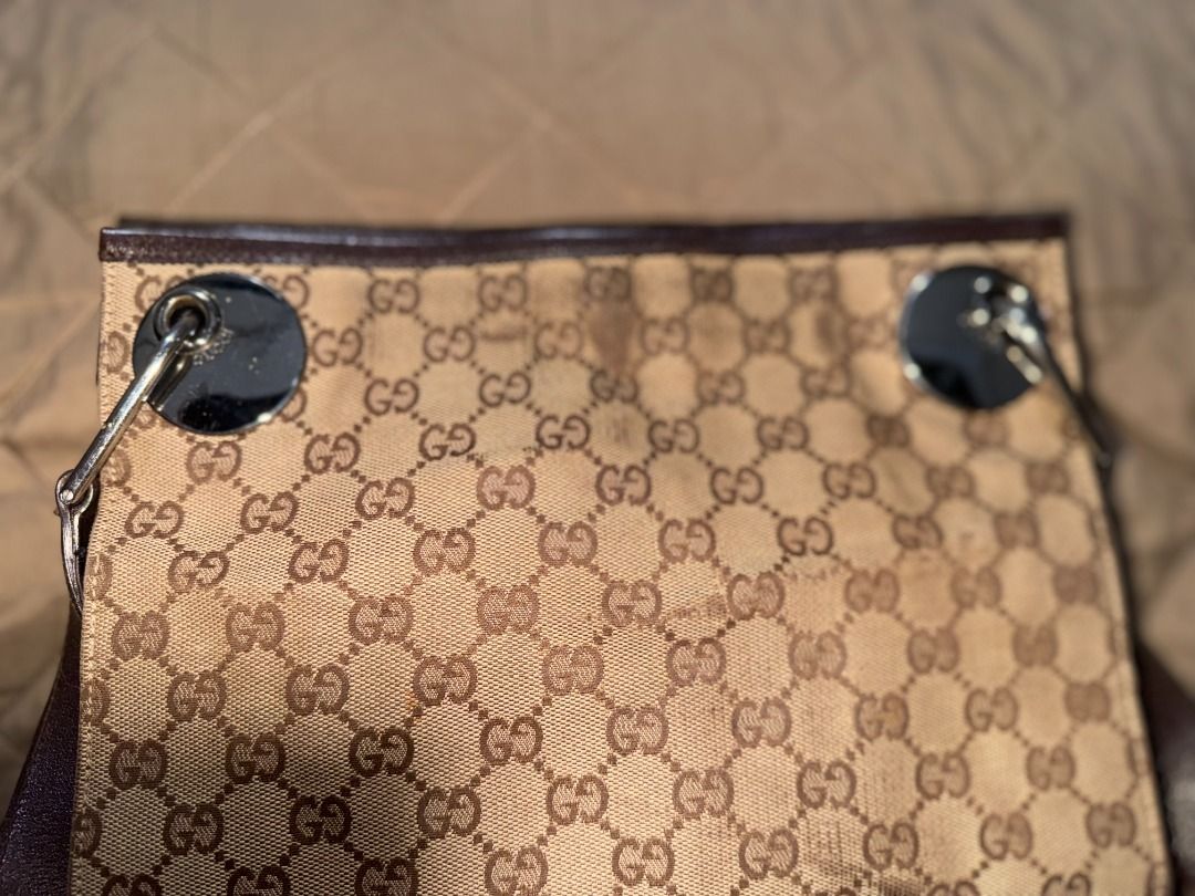 GG CANVAS ECLIPSE (Category: Luxury Bags & Wallets) located in San Pablo. Submitted by calmhawk.60c993 (Listing ID 1462218859, Image 2). Description: - Classic GG monogram canvas - Brown leather trim and strap - Silver hardware details - Signs of wear on canvas trim - Interior is clean - Great everyday bag.