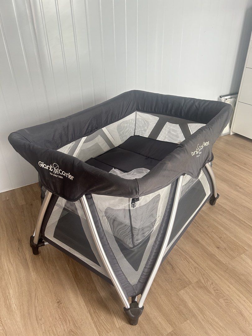 Giant Carrier Geofrey Playpen - Gray (Category: Cots & Cribs) located in Quezon City. Submitted by cheriesonlineshop (Listing ID 1462078702, Image 1). Description: - Brand: Giant Carrier - Model: Geofrey Playpen - Color: gray - Features: Easy to set up and pack away - Original Price: P11,999 one hand fold (folds with bassinet) with carry bag with changing table with upper bassinet adjustable mattress height .
