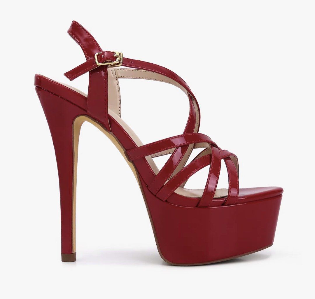 GIBI Red Patent Strappy Platform Stiletto Heels (Category: Heels) located in Marikina City. Submitted by ziaziaaa (Listing ID 1462114086, Image 3). Description: - Brand new red patent heels - Criss-cross strap design - Secure buckle ankle strap - High stiletto heel - Thick platform - Ideal for parties and nights out.
