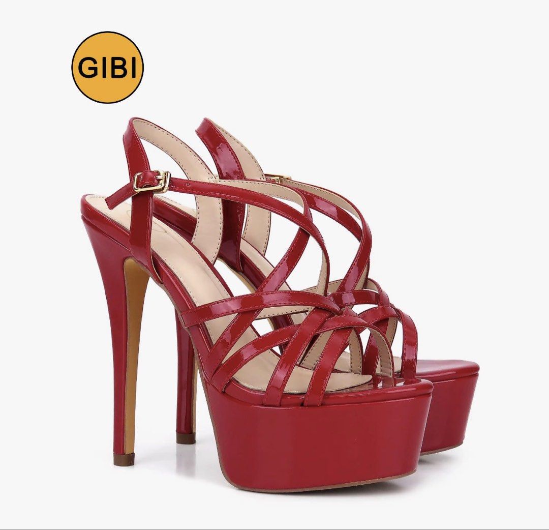 GIBI Red Patent Strappy Platform Stiletto Heels (Category: Heels) located in Marikina City. Submitted by ziaziaaa (Listing ID 1462114086, Image 1). Description: - Brand new red patent heels - Criss-cross strap design - Secure buckle ankle strap - High stiletto heel - Thick platform - Ideal for parties and nights out.