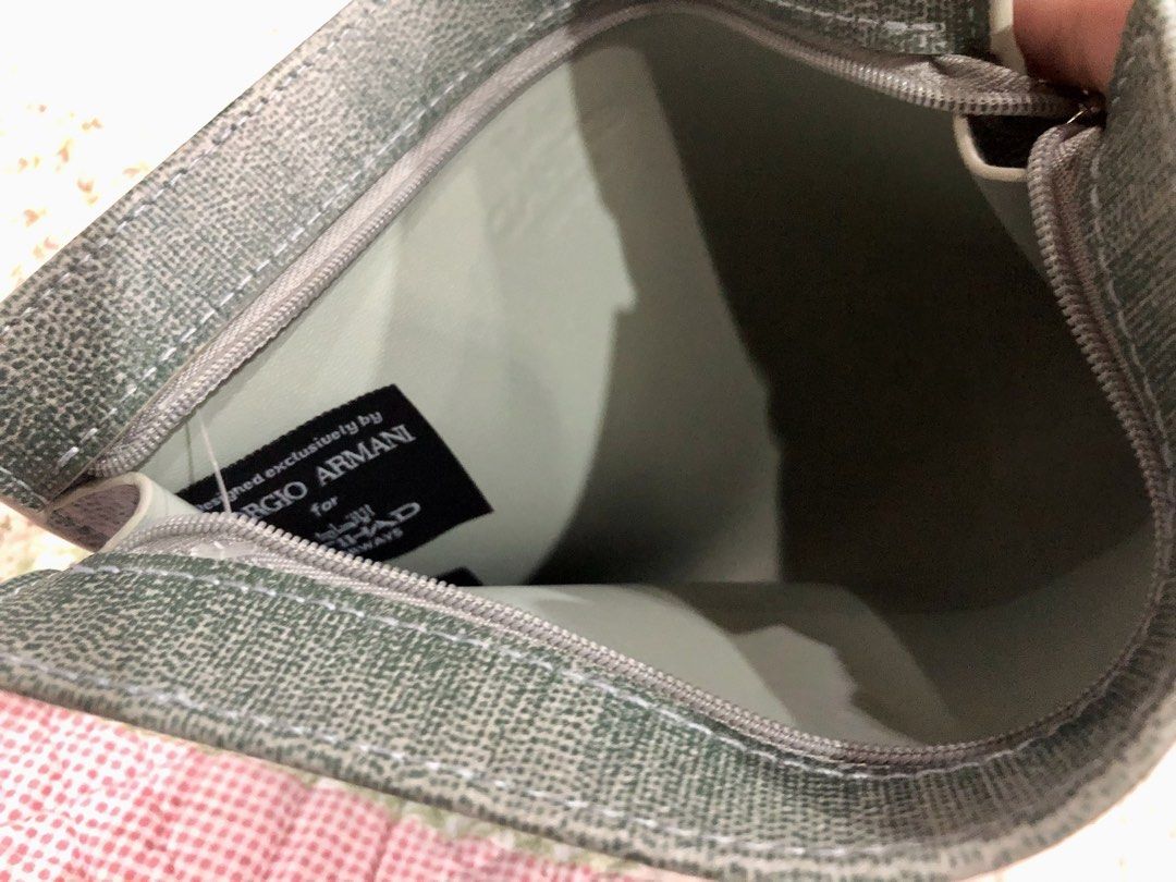 Giorgio Armani Cosmetic Pouch-Green (Category: Accessory Holder, Box & Organizers) located in Quezon City. Submitted by sheisdecluttering_now (Listing ID 1462074726, Image 3). Description: from Etihad Airways .