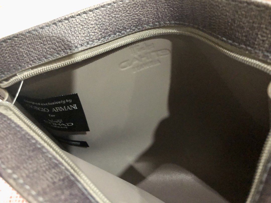 Giorgio Armani Cosmetic Pouch-Purple (Category: Accessory Holder, Box & Organizers) located in Quezon City. Submitted by sheisdecluttering_now (Listing ID 1462074252, Image 3). Description: from Etihad.