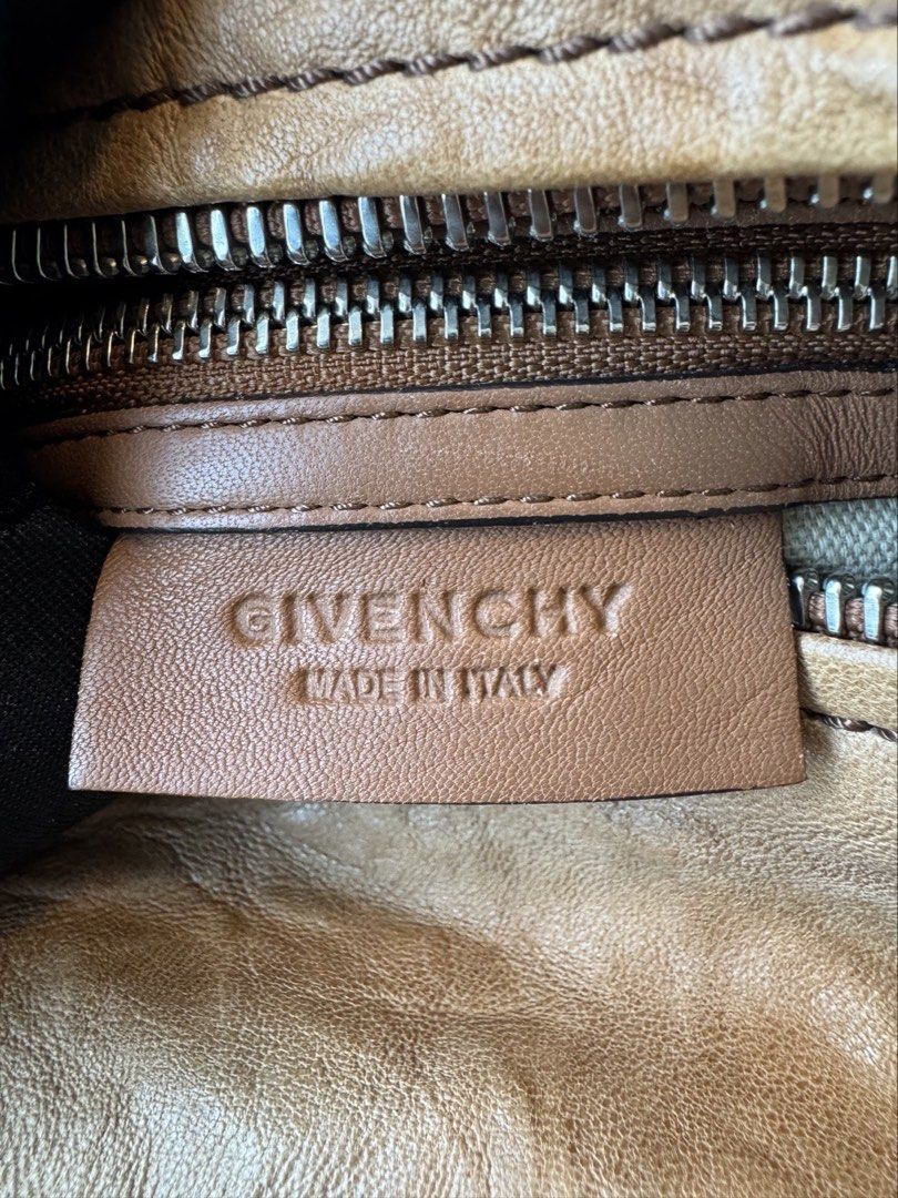 Givenchy Pandora Small (Category: Luxury Bags & Wallets) located in Bacolod City. Submitted by amzpico (Listing ID 1462139241, Image 3). Description: - Authentic Brown Leather Givenchy pandora Bag - Comes with original dust bag and authenticity cards - Detachable strap for versatile carrying options - Ideal for everyday use.