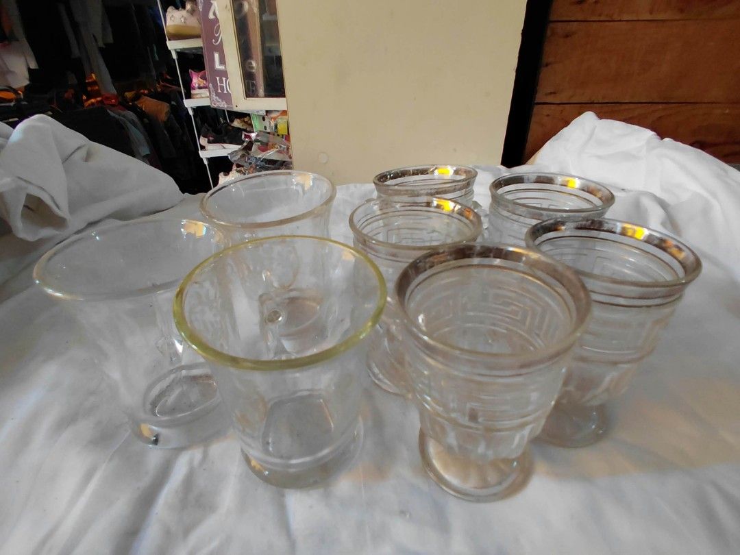 Glass (Category: Other Kitchen Appliances) located in Manila. Submitted by rubymielbona (Listing ID 1462043794, Image 3). Description: - Set of assorted glasses - Features moon and star motifs - Some glasses have decorative gold or silver rims - Suitable for hot or cold beverages - In good, pre-loved condition.