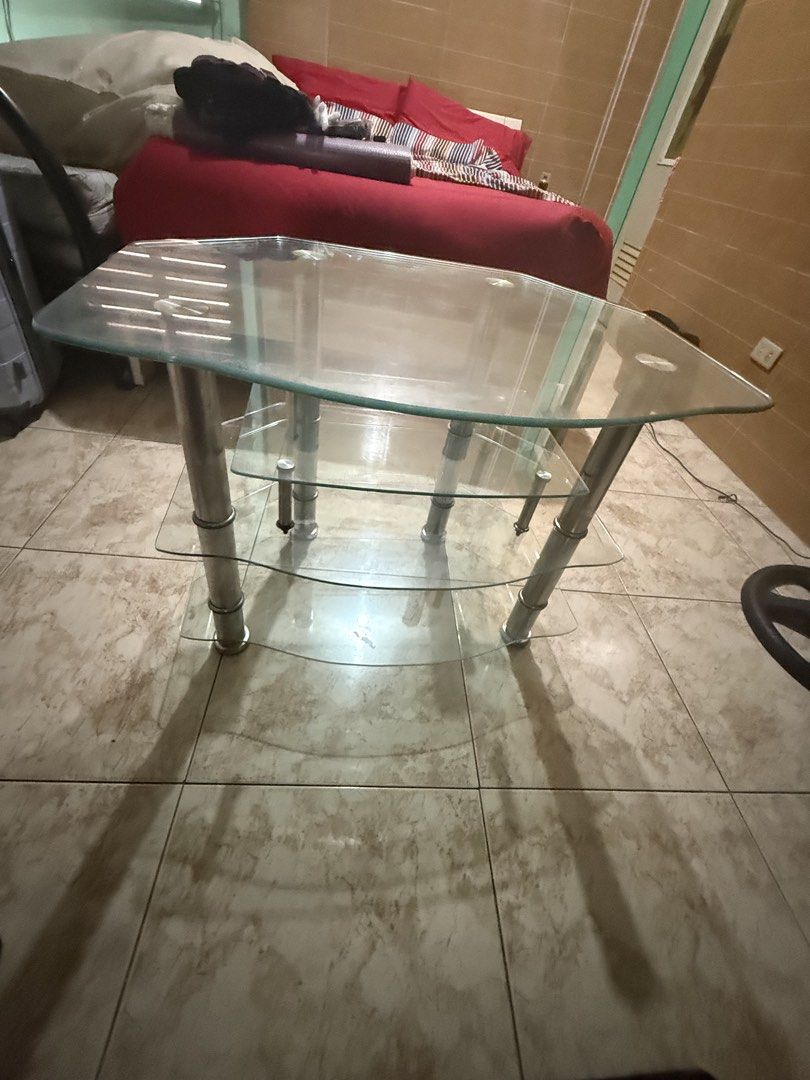 Tempered Glass Table with Metal Legs (Category: Tables & Sets) located in Quezon City. Submitted by imayin (Listing ID 1462090974, Image 2). Description: Tempered glass - Octagonal glass coffee table - Two tiers with larger top glass - Sleek metal legs - Ideal for living rooms or display - Easy to clean.