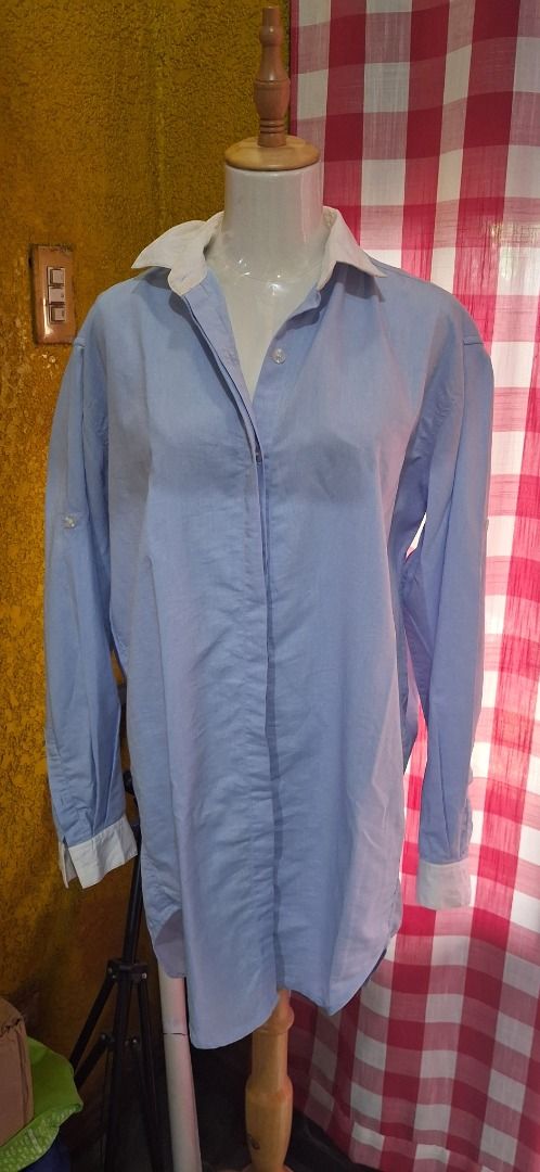 GOALONEWITHALU Blue & White Collared Button-Up Shirt Size S (Category: Tshirts & Polo Shirts ) located in Manila. Submitted by katkween23 (Listing ID 1462056056, Image 2). Description: - Brand: GOALONEWITHALU - Color: Blue with white collar and cuffs - Style: Classic button-down shirt - Features: Long sleeves, button-up front, buttoned cuffs - Size: S - Versatile: Suitable for work or casual occasions.