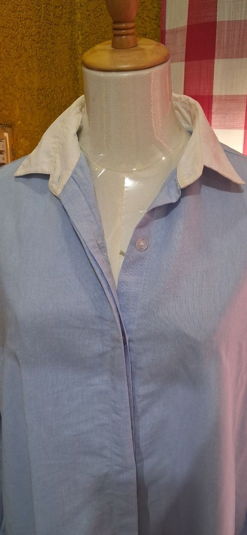 GOALONEWITHALU Blue & White Collared Button-Up Shirt Size S (Category: Tshirts & Polo Shirts ) located in Manila. Submitted by katkween23 (Listing ID 1462056056, Image 3). Description: - Brand: GOALONEWITHALU - Color: Blue with white collar and cuffs - Style: Classic button-down shirt - Features: Long sleeves, button-up front, buttoned cuffs - Size: S - Versatile: Suitable for work or casual occasions.