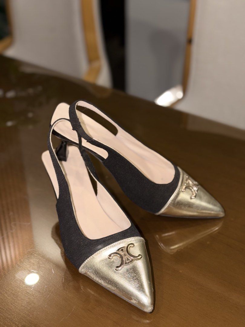 Gold and Black Heels (Category: Heels) located in Manila. Submitted by grand.preloved.club (Listing ID 1462188155, Image 1). Description: Elegant Gold and Black Heels •Size 8 • 10/10 Condition, like new RFS: Decluttering.