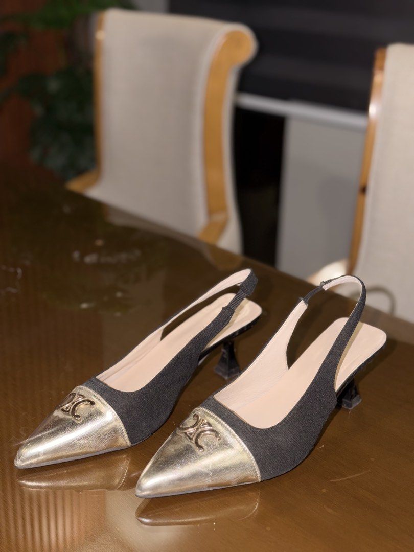 Gold and Black Heels (Category: Heels) located in Manila. Submitted by grand.preloved.club (Listing ID 1462188155, Image 2). Description: Elegant Gold and Black Heels •Size 8 • 10/10 Condition, like new RFS: Decluttering.