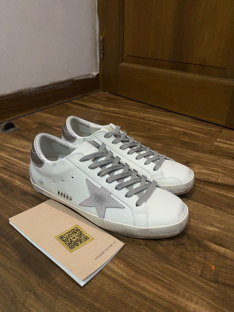 Golden Goose silver tab with lettering (Category: Casual Shoes) located in Pasay City. Submitted by abbynacy77 (Listing ID 1462199746, Image 1). Description: -Legit (With NFC Authentication) -With Passport -Negotiable -Size EU43.