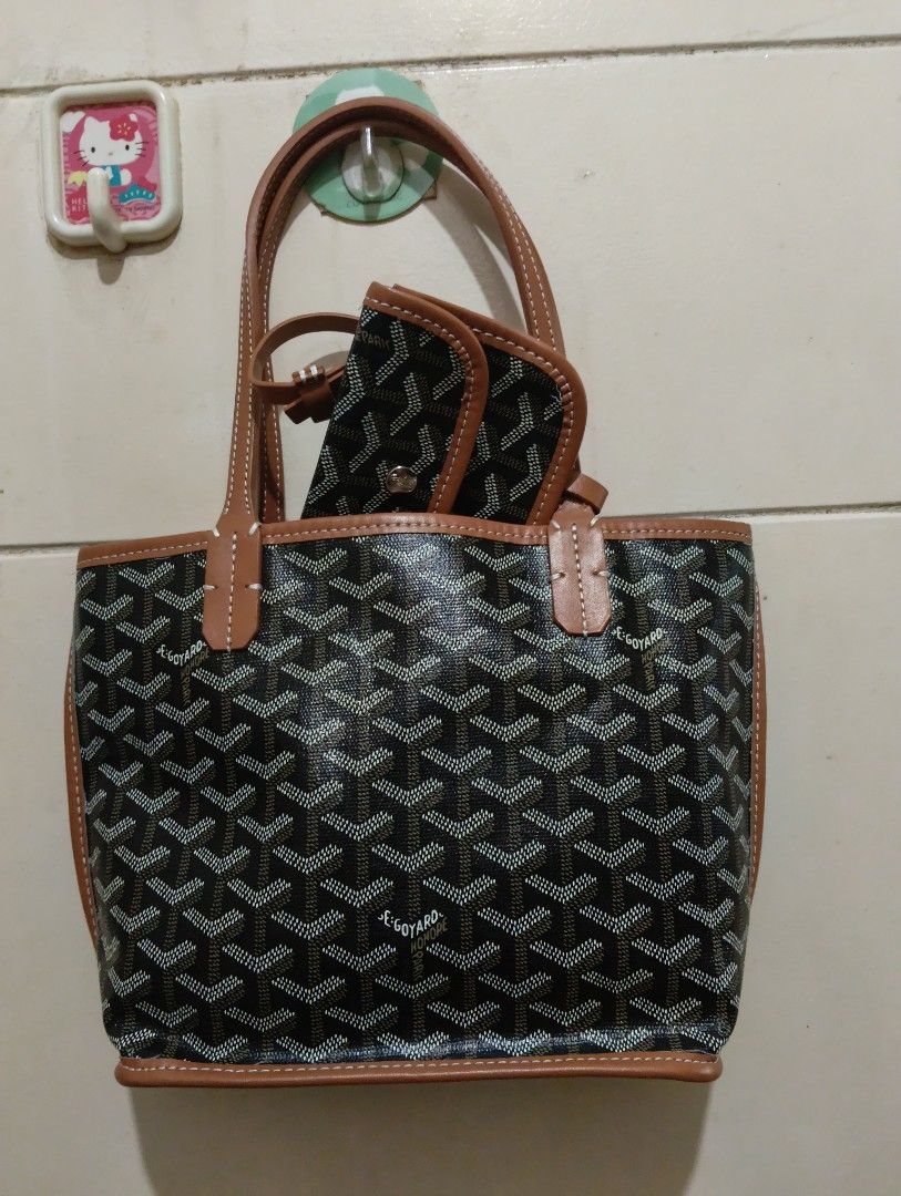 Goyard Tote Bag with Matching Pouch (Category: Tote Bags) located in Quezon City. Submitted by swiftcloud_070a6b (Listing ID 1462154439, Image 1). Description: - Classic Goyard tote bag - Includes a matching small pouch - Durable and stylish Goyardine canvas - Genuine leather trim and handles - Ideal for everyday use or travel - Spacious interior - Pouch is perfect for small essentials.
