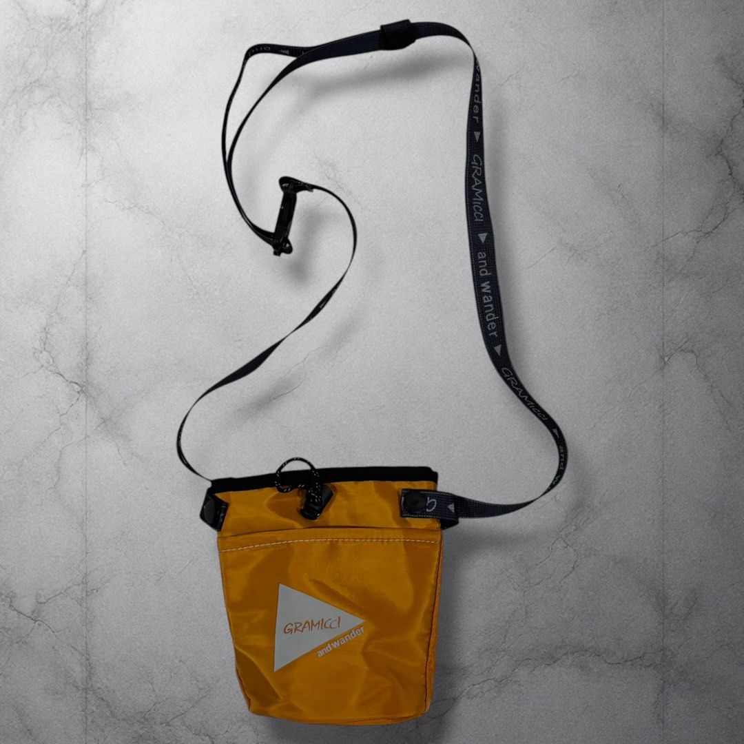Gramicci and Wander Shoulder Pouch Bag (Category: Sling Bags) located in Cavite. Submitted by itsayaaa (Listing ID 1462095014, Image 1). Description: - Yellow Gramicci x Wander pouch bag - Adjustable strap with branding - Secure drawstring closure - Convenient small front pocket - Ideal for carrying essentials on the go - Perfect for outdoor adventures or everyday casual wear.