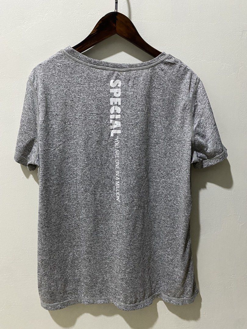 Gray drifit tee (Category: Shirts) located in Makati City. Submitted by indaysukaycloset (Listing ID 1462090181, Image 3). Description: GRAY DRIFIT TEE! 🩶 Mine: drifitgray ₱100 Brand: SHEIN | Size L on tag Width: 19" flat (38" paikot) Length: 23" - Color: Gray heather - Fabric: Drifit / poly blend - presko & stretchy! - Back print: "SPECIAL YOU ARE ONE IN A MILLION" - Pang-gym / pang-jogging / pang-daily - Lightweight & breathable - 9/10 conditi
