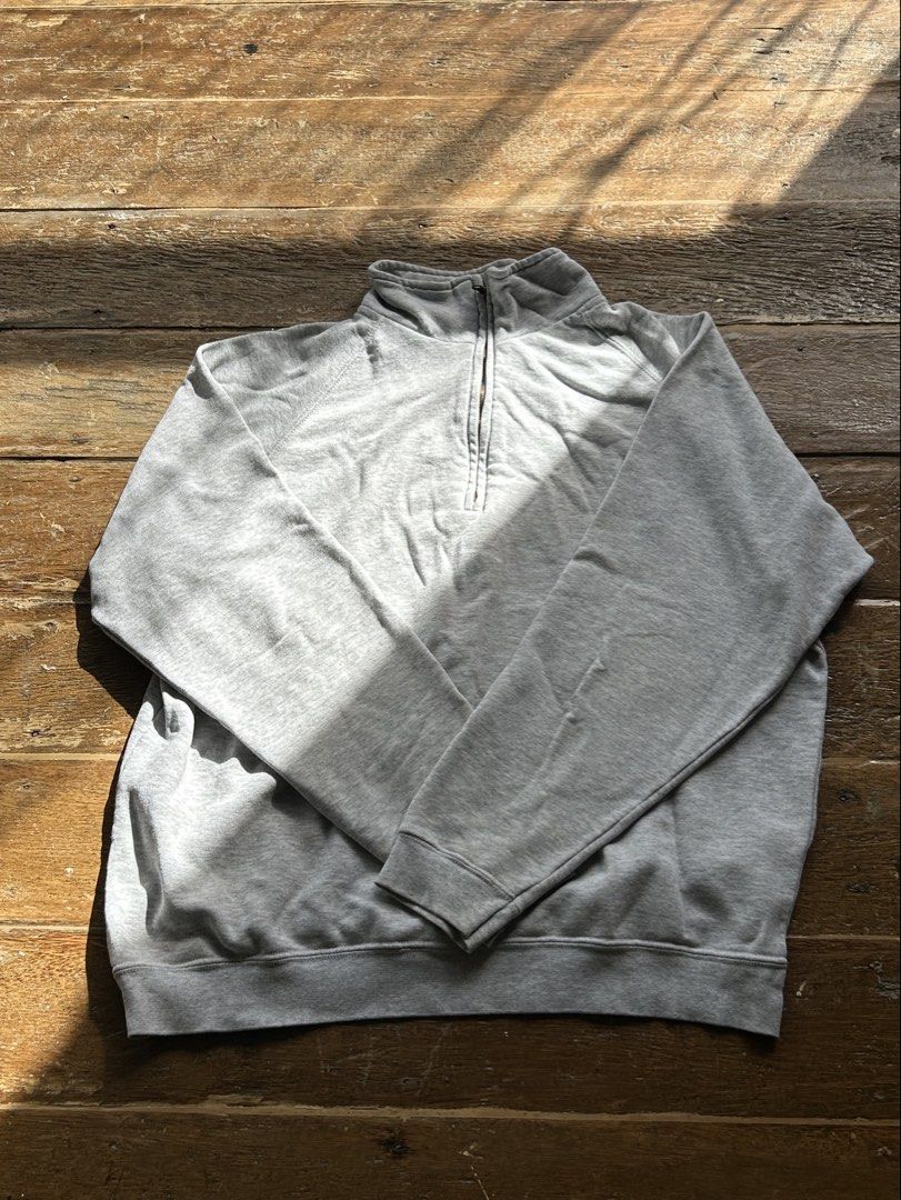 Grey Quarter Zip Sweatshirt (Category: Coats, Jackets and Outerwear) located in Surigao. Submitted by chastnavarrete (Listing ID 1462223486, Image 1). Description: - Grey quarter zip sweatshirt - Comfortable and casual - Ideal for layering - Features ribbed cuffs and hem - Great for everyday wear.