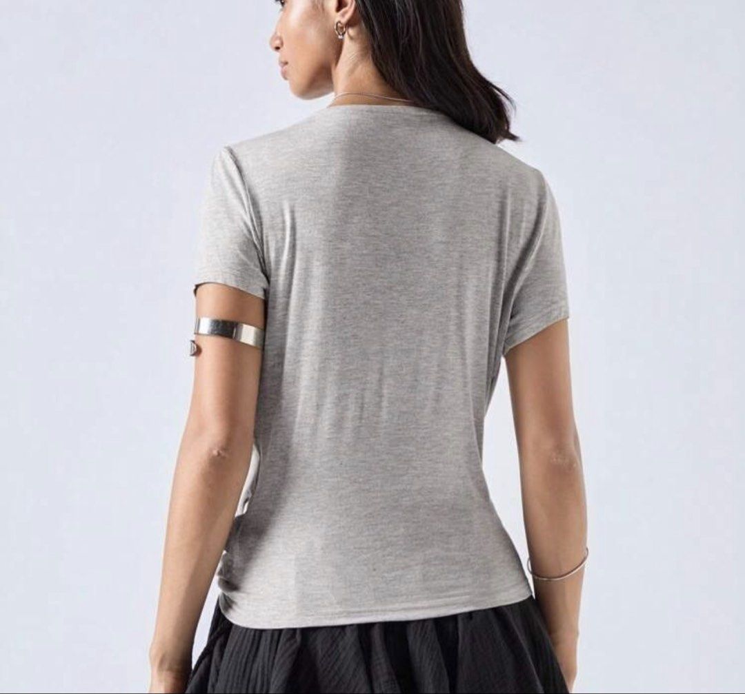 Grey Slouch Neck Top Y2K (Category: Blouses) located in Makati City. Submitted by audrey.hepburn (Listing ID 1462115823, Image 2). Description: - Super soft grey top - Unique drape neckline - Cap sleeves - Lightweight and comfortable fabric - Versatile: dress up or down - Flattering fit - Ideal for nights out or casual days.