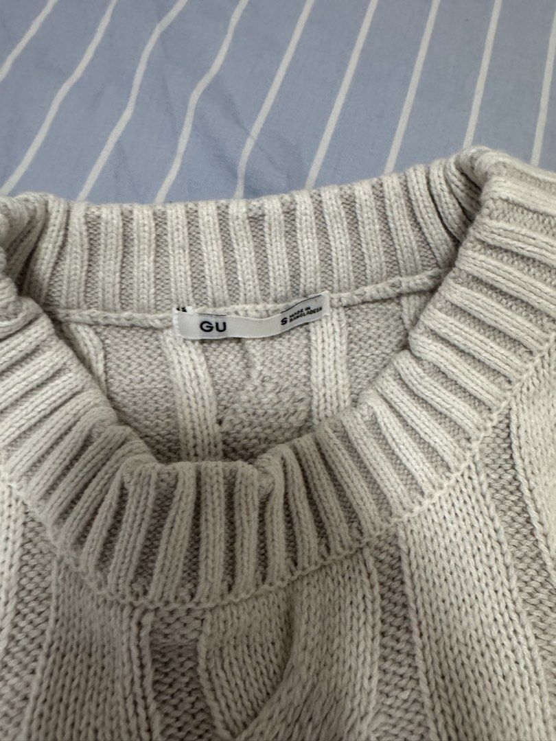GU Cable Knit Crew Neck Sweater (Category: Longsleeves) located in Paranaque City. Submitted by frizb3rry (Listing ID 1462068623, Image 2). Description: - GU cream/light beige cable knit sweater - Classic crew neck, long sleeves - All-over cable knit pattern - Ribbed cuffs, hem, and neckline for a snug fit - Super cozy and warm, ideal for layering or standalone wear.