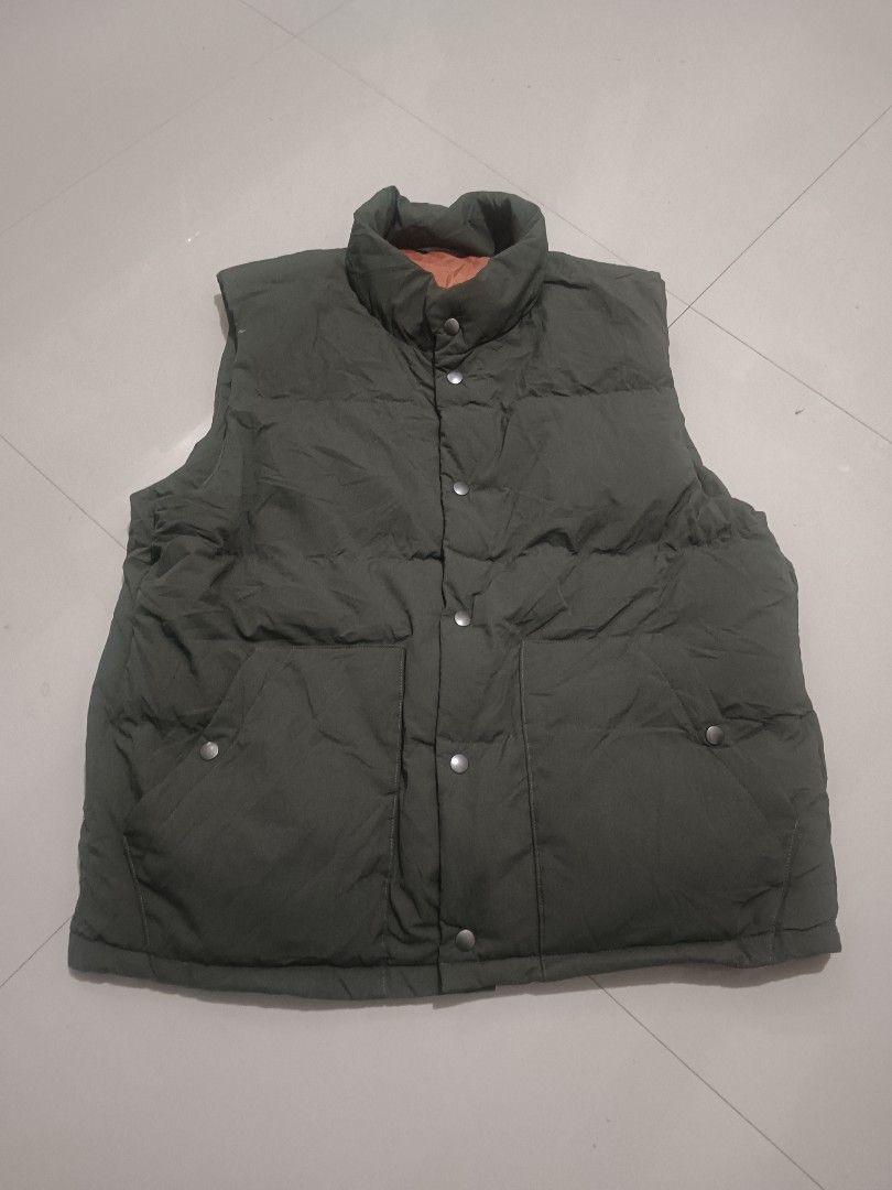 GU Puffer Vest Green Orange Reversible (Category: Coats, Jackets and Outerwear) located in Manila. Submitted by xelll7 (Listing ID 1462078887, Image 1). Description: - GU Green Puffer Vest - Reversible with orange lining - Features front pockets - Ideal for layering and cooler weather - Material details on tag - Selling as is.