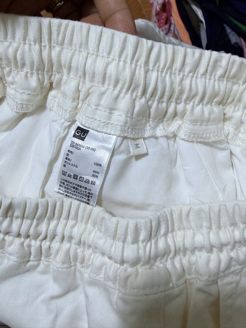GU White Cargo Pants (Category: Other Bottoms) located in Paete. Submitted by skydruemadison (Listing ID 1462166656, Image 3). Description: - Brand: GU - Color: White - Style: Cargo Pants - Waistband: Elastic with drawstring - Pockets: 2 side pockets, 2 cargo pockets - Cuffs: Elastic at the bottom - Features: Comfortable, casual, great for everyday wear.