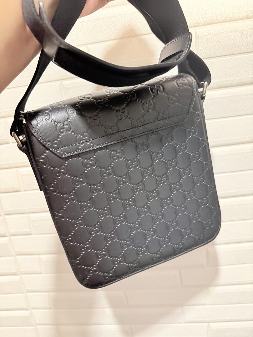 GUCCI Guccissima Flap Messenger Bag (Category: Luxury Bags & Wallets) located in Quezon City. Submitted by slowpopanda (Listing ID 1462202527, Image 2). Description: Dimensions: Height 30.00cm x Width 25.50cm x Depth 5.50cm Material: Calf Leather 100% Condition: GOOD. Looks New Made in Italy Embossed leather body Adjustable flat strap Front leather flap with buckle closure Interior zip and slip pockets This previously owned and used item is in go