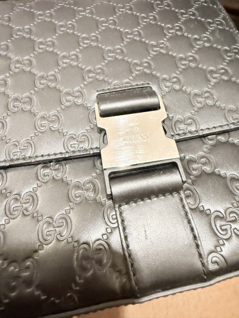 GUCCI Guccissima Flap Messenger Bag (Category: Luxury Bags & Wallets) located in Quezon City. Submitted by slowpopanda (Listing ID 1462202527, Image 3). Description: Dimensions: Height 30.00cm x Width 25.50cm x Depth 5.50cm Material: Calf Leather 100% Condition: GOOD. Looks New Made in Italy Embossed leather body Adjustable flat strap Front leather flap with buckle closure Interior zip and slip pockets This previously owned and used item is in go