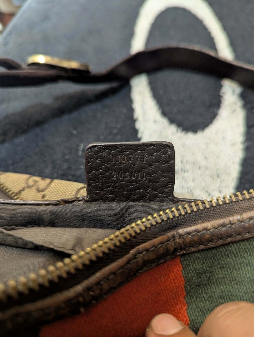 Gucci Monogram Canvas & Leather Stripe Hobo Bag (Category: Luxury Bags & Wallets) located in Manila. Submitted by roblesniks33584 (Listing ID 1462047067, Image 3). Description: - Authentic Gucci hobo bag - Classic GG monogram canvas - Signature green and red stripe detail - Genuine leather trim and strap - Interior zippered pocket - Leather tag with serial number - Gucci branded zipper pull - Perfect for everyday use.