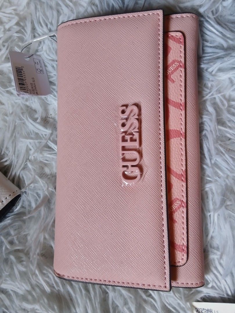 GUESS LONG WALLET IMPORTED (Category: Wallets & Card holders) located in Calumpit. Submitted by collectionspurses (Listing ID 1462185122, Image 2). Description: OG GUESS WALLET FROM CANADA 🇨🇦 BRAND NEW.