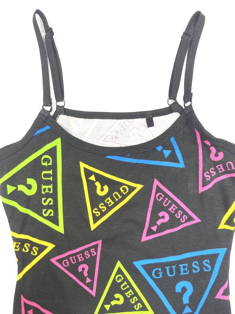 Guess Neon Graphic Cami Tank Top (Category: Sleeveless) located in Angeles City. Submitted by fruits.ph (Listing ID 1462164414, Image 3). Description: Measurements B:14” W:11” L:14”(w/o straps) Size on Tag: XS Best Fit: S-M *Flat lay measurements* Mannequin Size: M (34”; 25”) Color Rate: 10/10 Flaws: None Fabric Type: Cotton/ Stretchable Fabric Addt’l Note: Almost brand new ***Color may vary due to lighting. This item is properly washed and disin